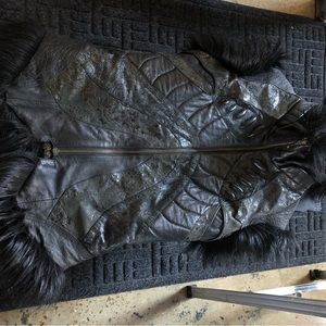 AYYA Wear exquisitely crafted handmade leather vest with faux fur accents